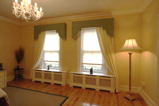 two radiator covers under windows